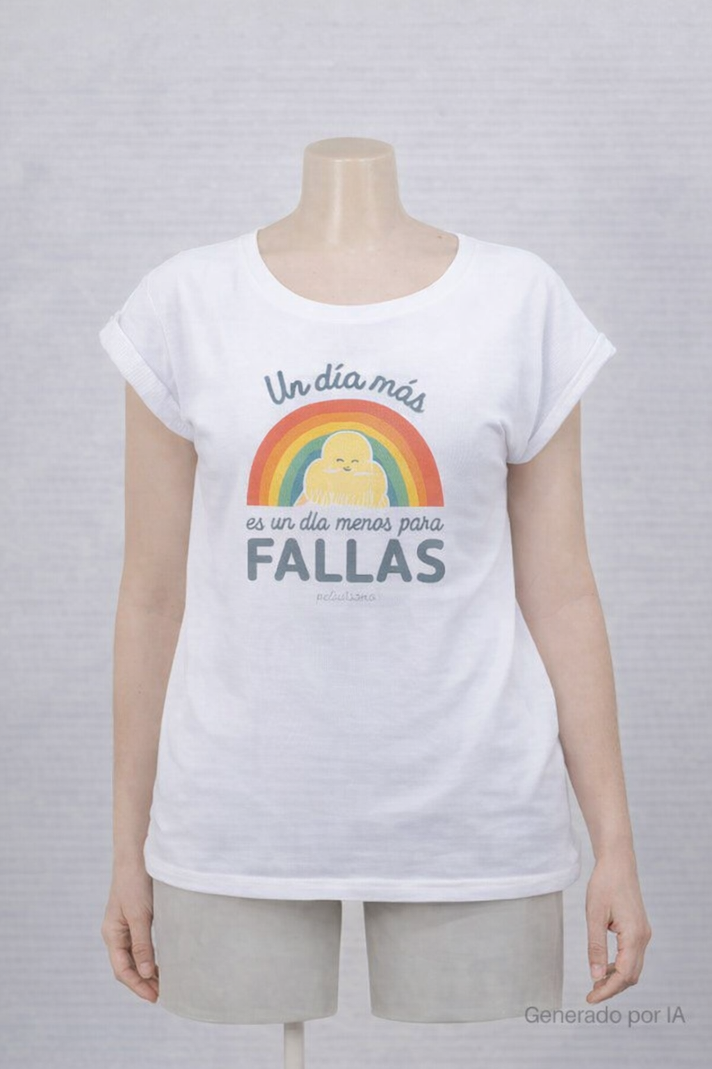 Camiseta de adulto blanca con ilustración colorida y el mensaje “Un día más es un día menos para Fallas”, mostrada en maniquí sobre fondo neutro.