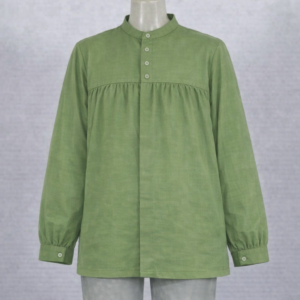 Blusón verde claro para adolescente, con cuello mao, botones frontales y corte amplio, confeccionado en tejido ligero y cómodo.